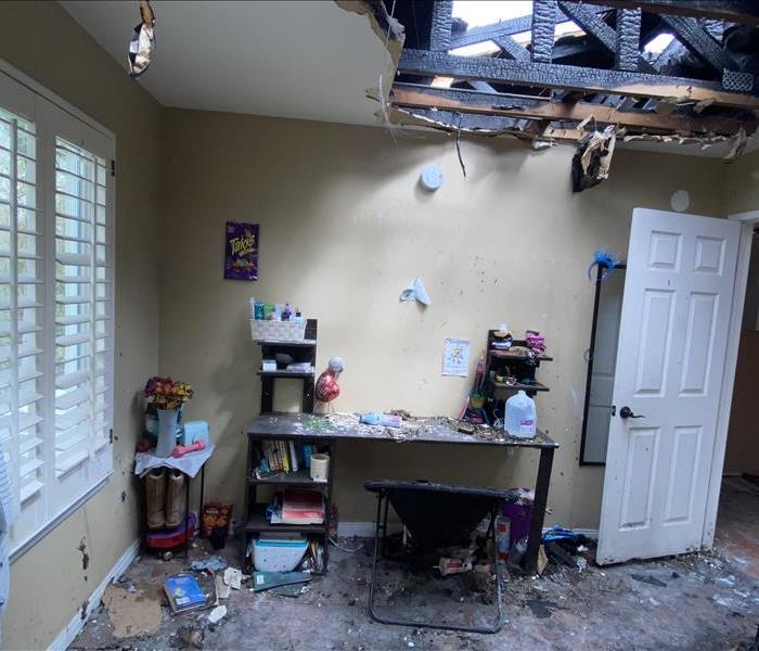 Roof collapse into office of single family dwelling